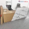 Quầy Lễ Tân Góc L Nan Dọc Phối Mặt Vân Đá Cũ